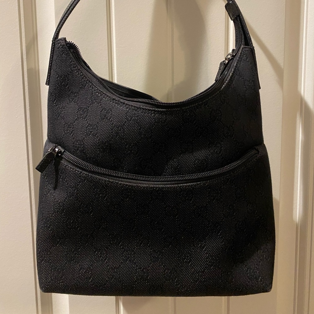 Designer handbag, authentic Gucci purse.